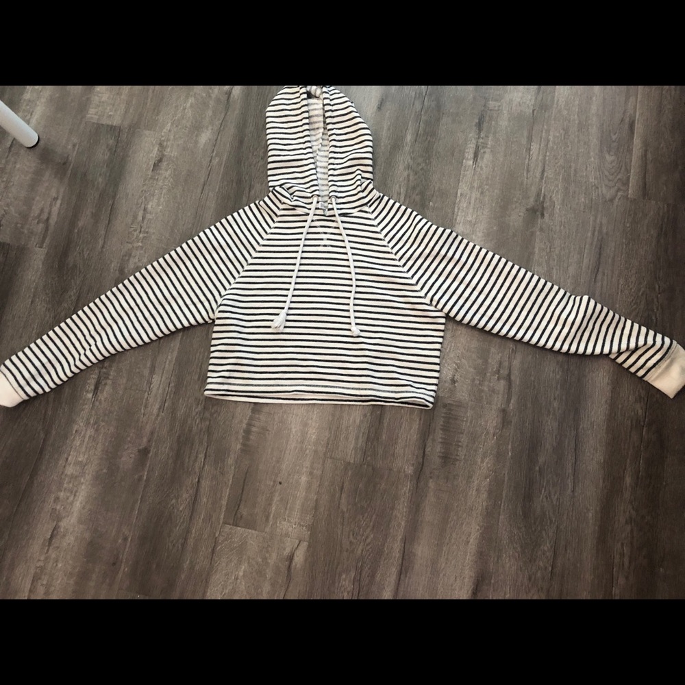 Black and white striped cropped hoodie.